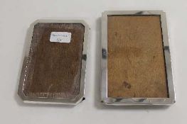 Two silver photograph frames. (2) CONDITION REPORT: Fair condition, the oak backs in good