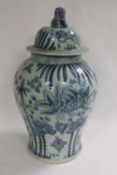 A pair of Chinese blue and white lidded temple urns, height 64 cm. (2) CONDITION REPORT: Good