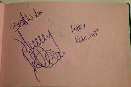 An autograph album containing football signatures John Barnes, Barry Venison, Harry Redknapp etc.