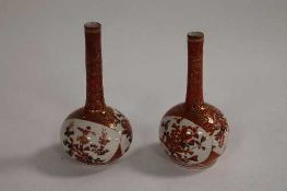 A pair of miniature Japanese Kutani bottle vases, signed. (2) CONDITION REPORT: Height of 12 cm