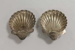 A pair of silver butter shells. (2) CONDITION REPORT: Good condition, with engraved inscription.