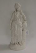 A parian figure - The water carrier, height 45 cm. CONDITION REPORT: Good condition, no damage or