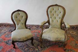 A Victorian walnut Lady's chair, together with a similar nursing chair. (2) CONDITION REPORT: Frames