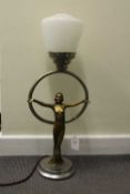 An Art Deco patinated spelter table lamp with glass shade, height 57. CONDITION REPORT: Good