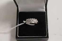 A nineteen stone diamond ring. CONDITION REPORT: Good condition, probably Edwardian in date, the