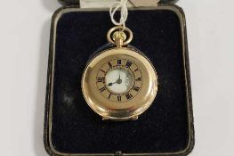 A 9ct gold half-hunter pocket watch. CONDITION REPORT: Good condition, requires a replacement