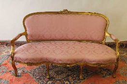 A nineteenth century style gilt wood settee, width 162 cm. CONDITION REPORT: Twentieth century piece