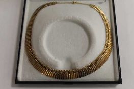 A 9ct gold flat-linked necklace, 23.7g. CONDITION REPORT: Good condition.