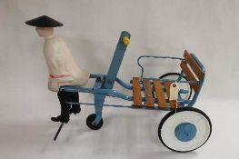 A 1950's Mobo Chinaman Rickshaw pedal car. CONDITION REPORT: Good condition.