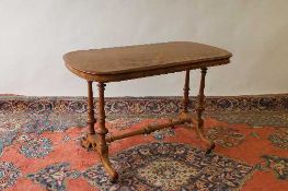 A Victorian walnut occasional table, width 107 cm. CONDITION REPORT: Some areas lifting on