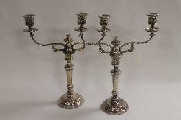 A pair of Sheffield plated candelabra, height 44 cm. (2) CONDITION REPORT: Good condition, time aged