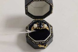 A late Victorian sapphire and pearl ring. CONDITION REPORT: Good condition, the yellow metal