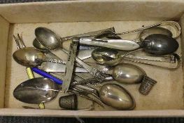 Sixteen items of silver cutlery, together with two silver thimbles and a silver mother of pearl