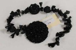 A Prada costume combination pinned necklace set with faux jet. CONDITION REPORT: Good condition.