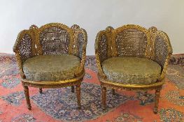 A pair of gilt wood double-bergere backed tub chairs. (2) CONDITION REPORT: Good condition, time