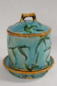 A majolica lidded barrel on stand, height 31 cm.  CONDITION REPORT: Time aged condition with surface