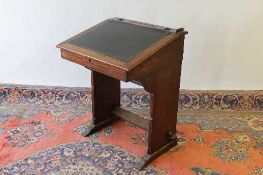 An early twentieth century mahogany clerk's desk, width 61 cm. CONDITION REPORT: Fair condition,