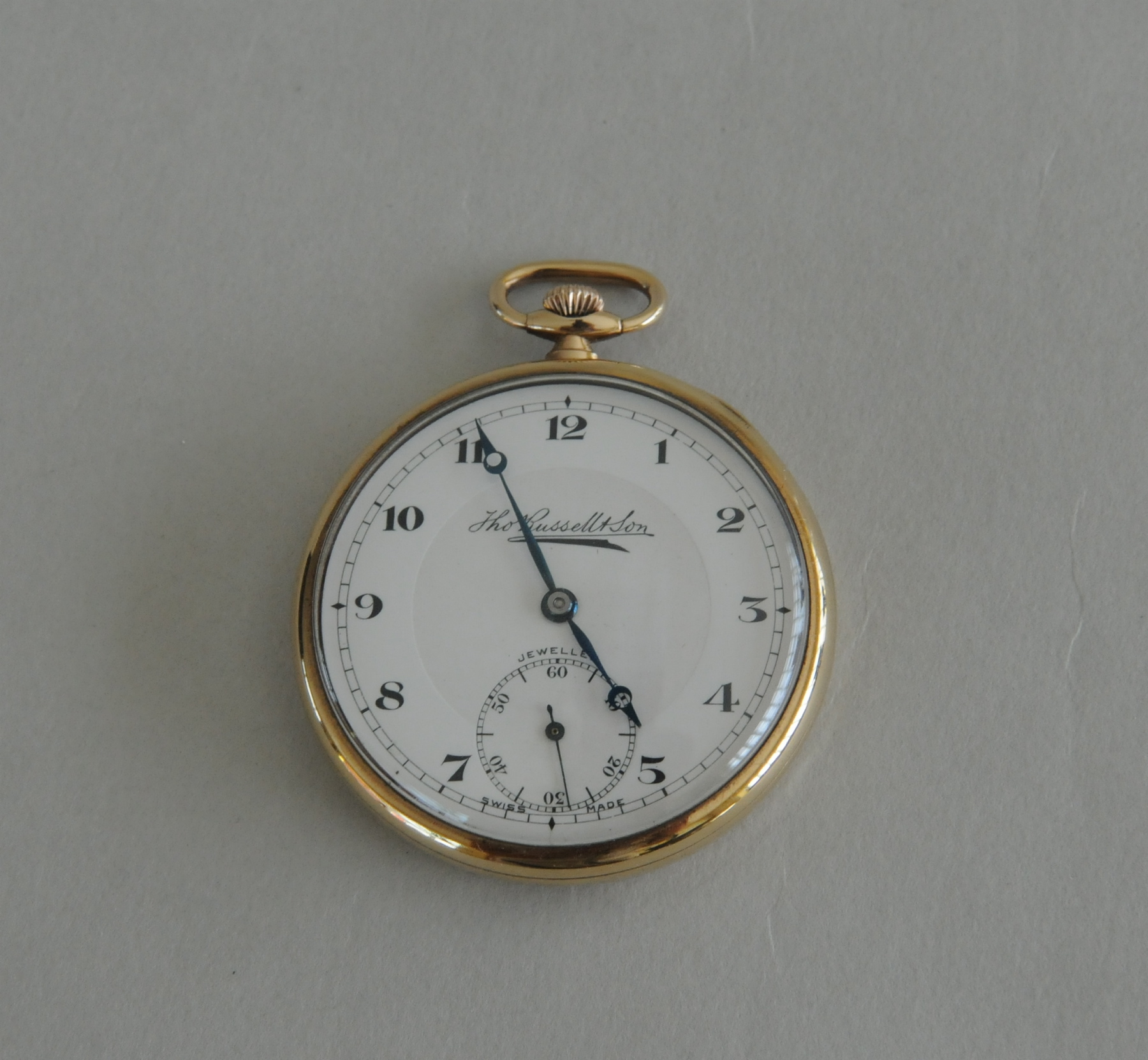 Swiss lever dress watch for Russells, in 9ct gold openface case, 1949.