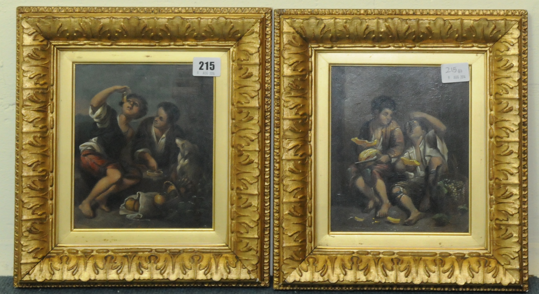 19TH CENTURY SPANISH SCHOOL AFTER MURILLO.
Peasant boys eating fruit & vegetables - a pair.
Oil on