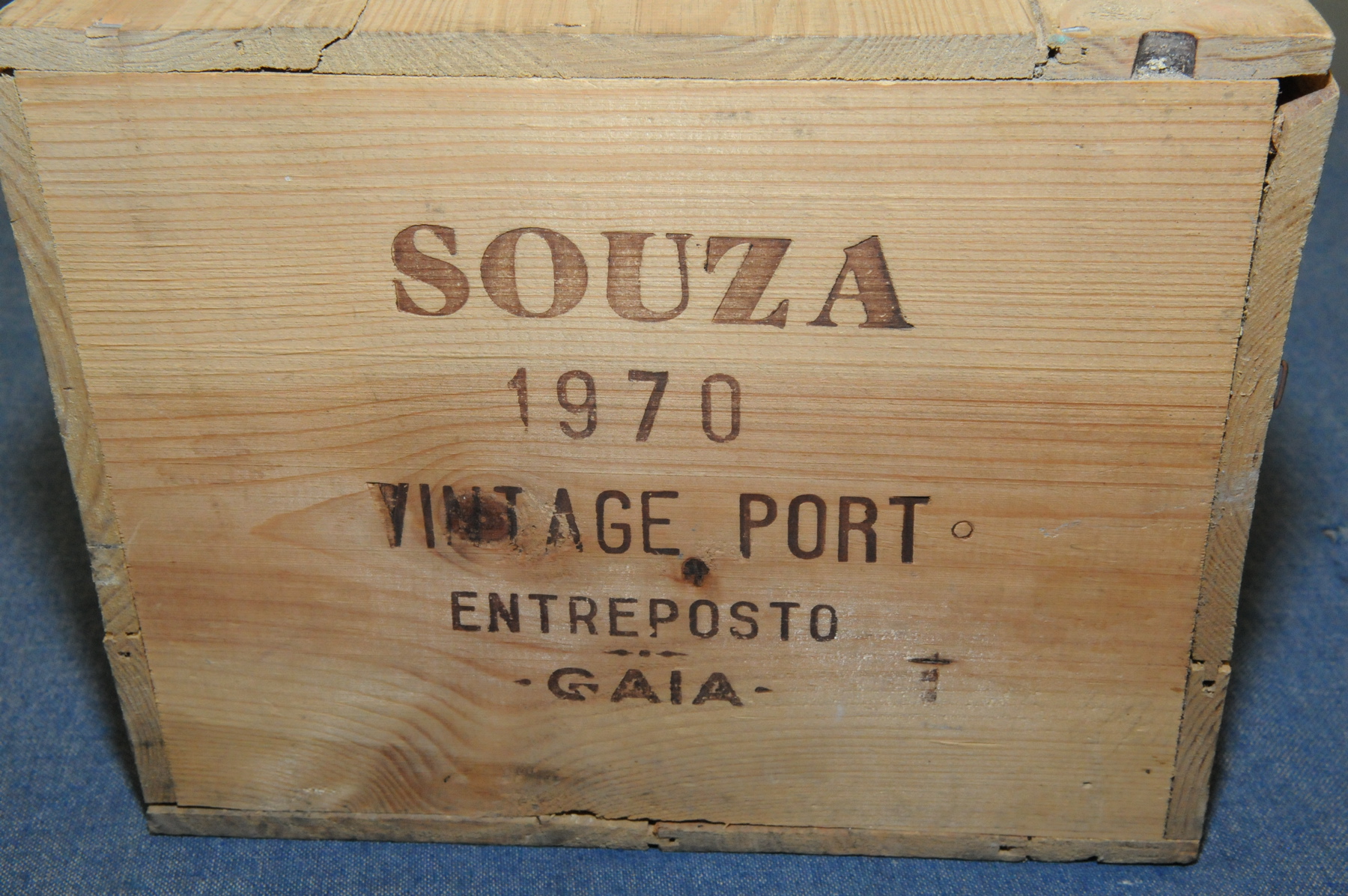 Twelve bottles of Souza 1970 Vintage Port contained in unopened wooden case with labels and stamps.