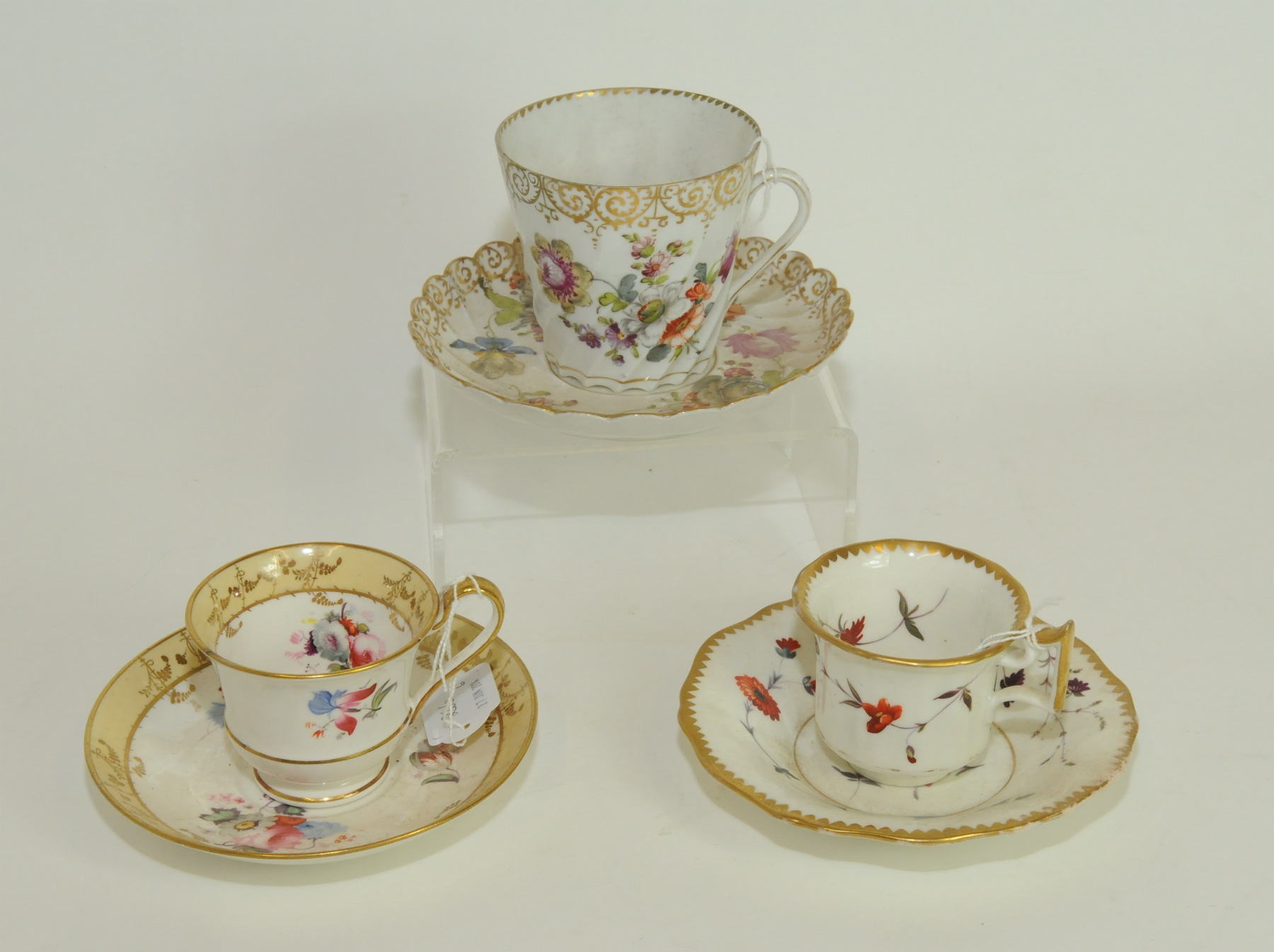 Dresden porcelain spiral fluted large cup & saucer with polychrome & gilt floral & scroll