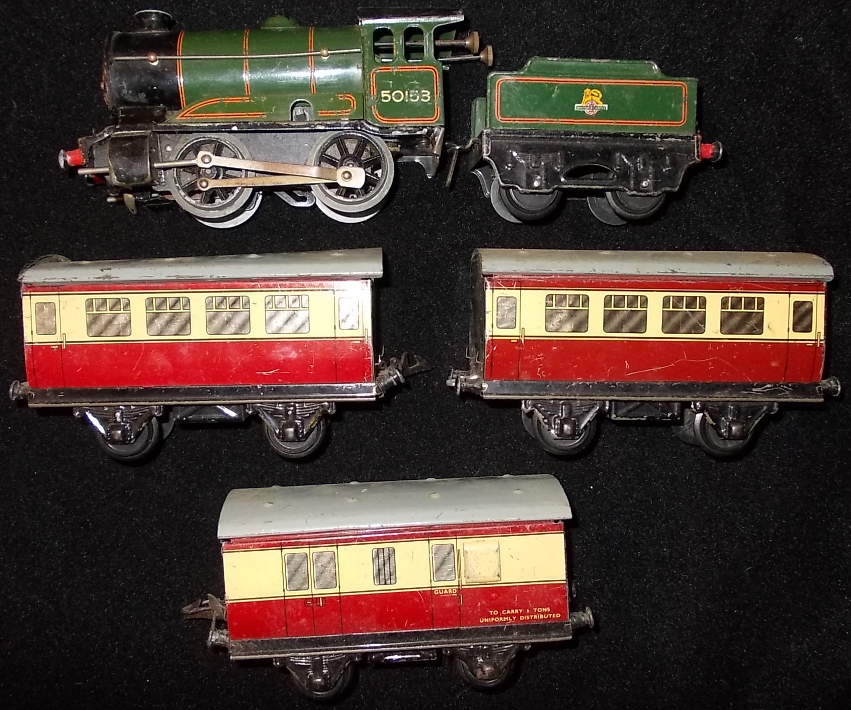 Hornby 0 gauge. Clockwork 0-4-0 loco & tender. 50153, green, B.R. Un-boxed.
