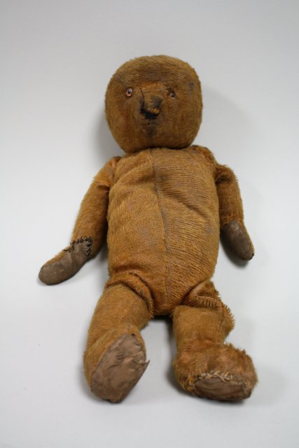 Antique hand sewn Teddy bear Early 20th century. Approx. 18"" H. Evenly worn. Evenly worn.