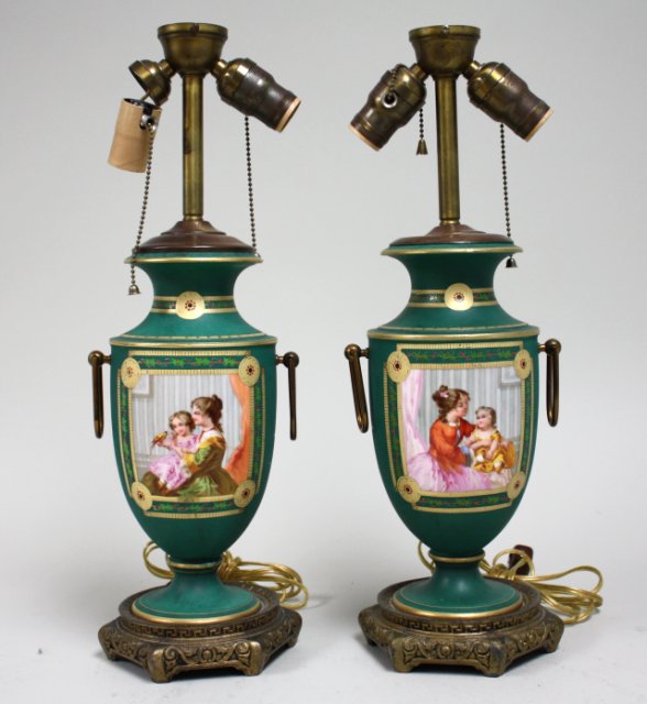 Pair of Old Paris lamps Hand painted scenes.  Approx. 13"" H. Repairs to 1  lamp. Repairs to 1