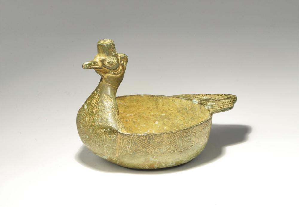 Chinese Style Bronze Peacock BowlAn undated archaistic cast bowl with D-shaped tail, tapering