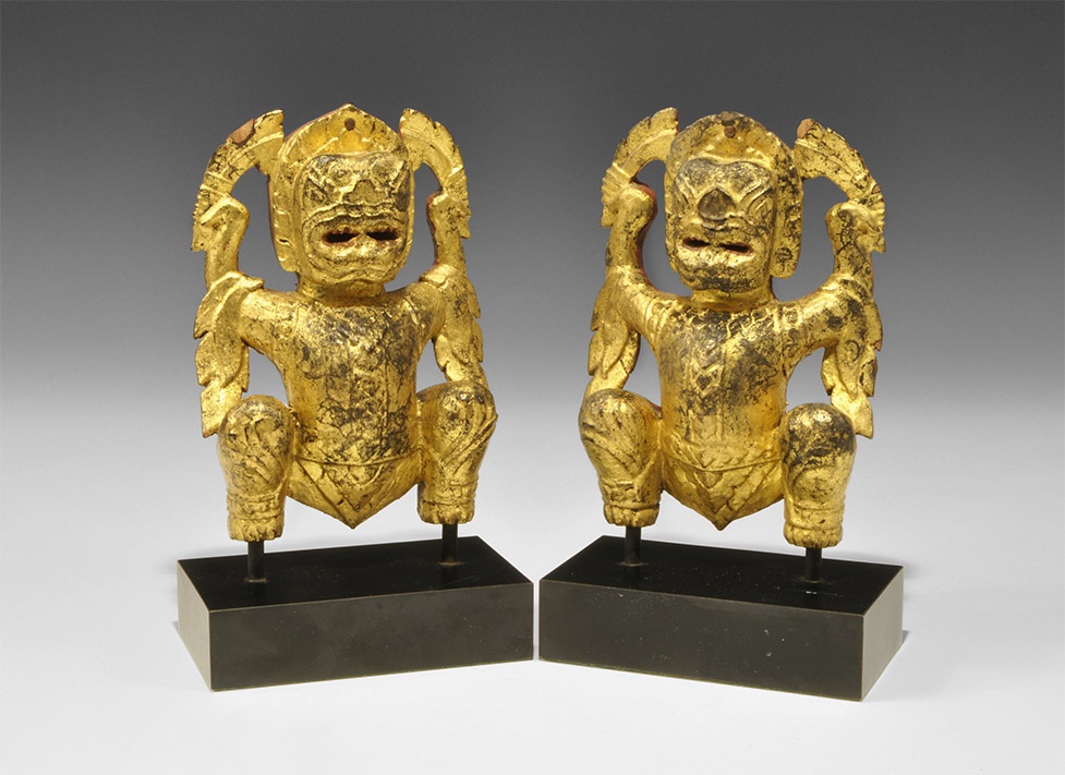 Burmese Gilt Wood Mythical Figure Pair19th century AD. A matched pair of carved mythical beasts,