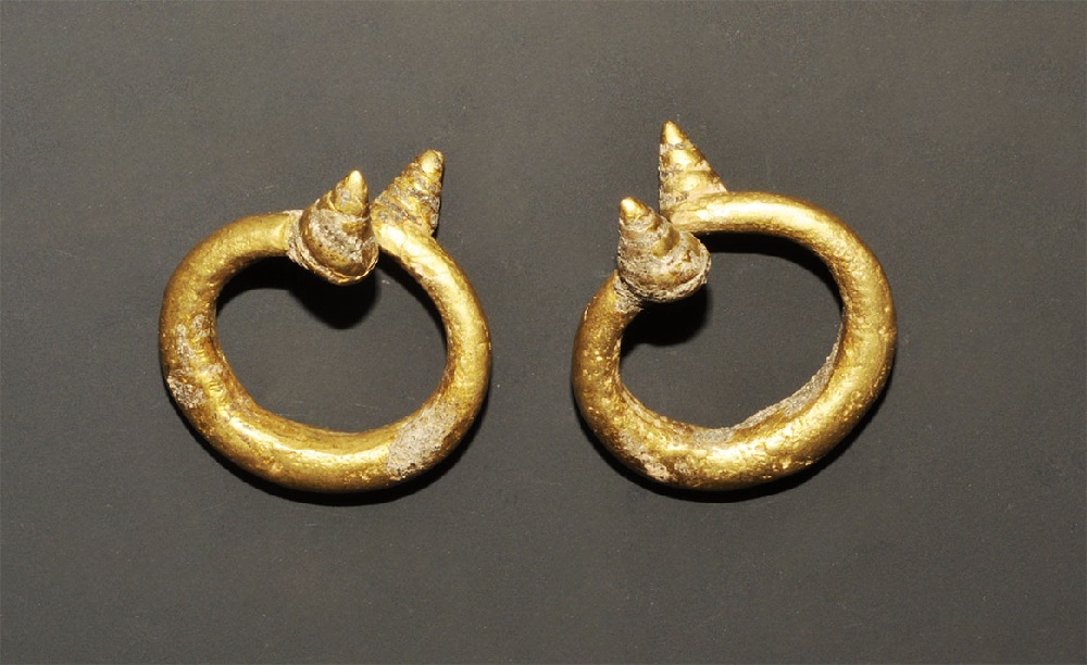 Near Eastern Style Gilt-Bronze Earring PairA pair of undated archaistic earrings, each formed as a