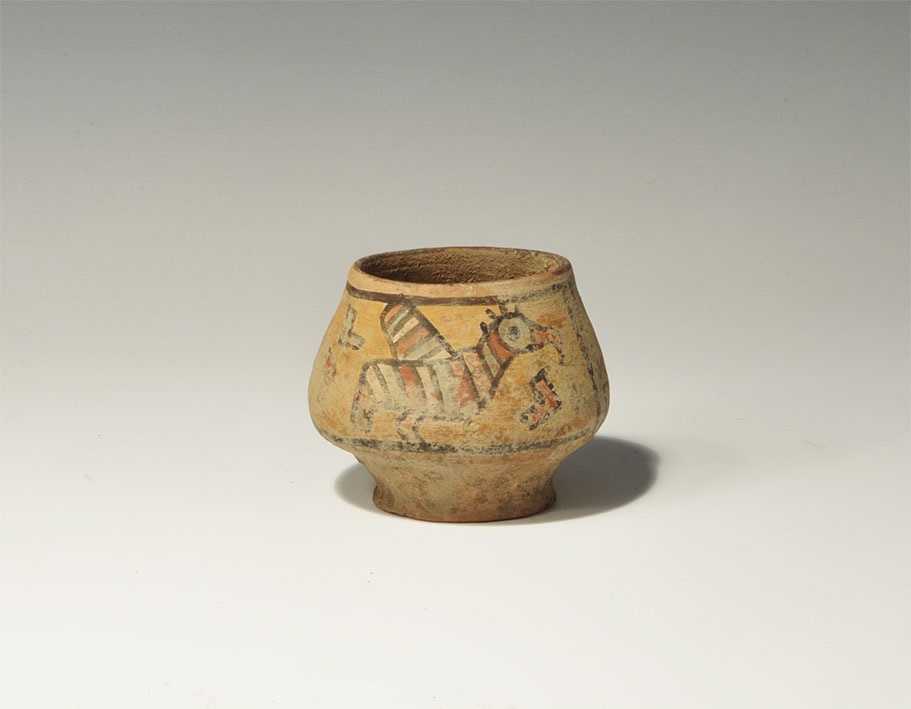 Indus Valley Painted Ceramic Pot with Birds3300-1300 BC. A miniature biconical terracotta pot with