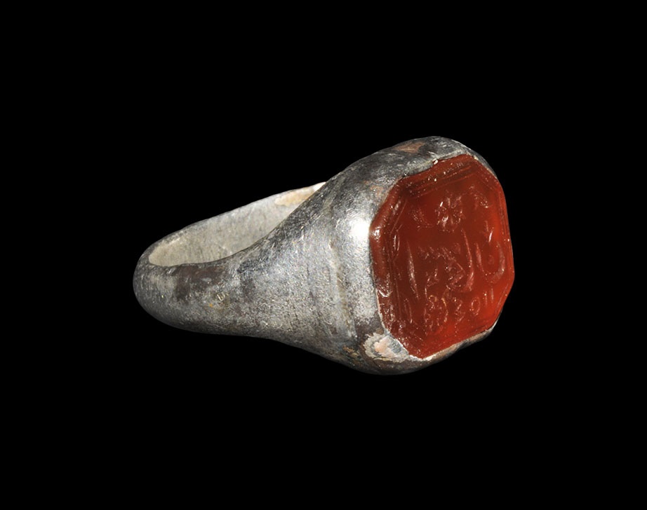 Near Eastern Persian Silver Ring with Intaglio19th century AD. A D-section hoop with expanding