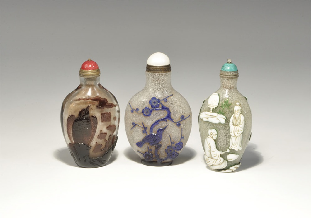 Chinese Glass Snuff Bottle Group20th century AD. A mixed group of miniature bottles comprising: