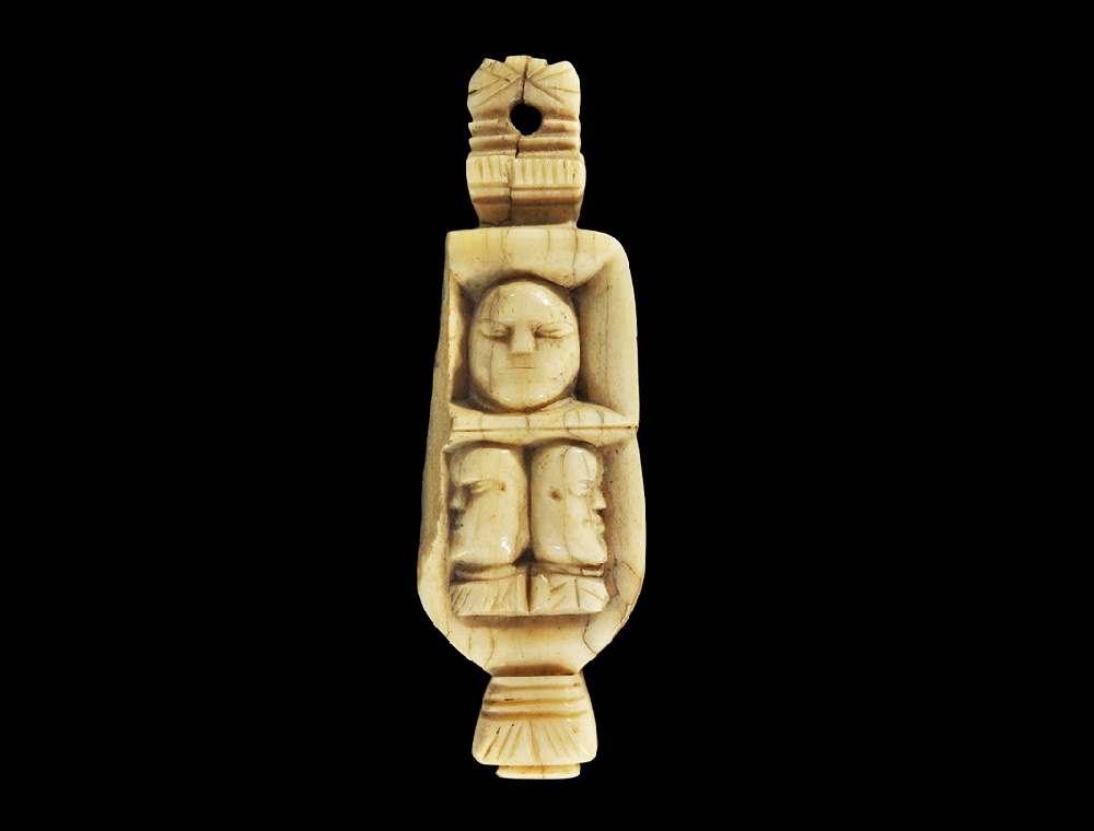 North American Bone Pendant with Tribal EldersPacific North West Coast, 18th-19th century AD. A