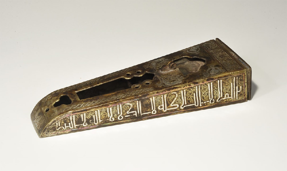 Islamic Gilt-Bronze Pen Box with Silver Calligraphic InlayAn undated archaistic rectangular-