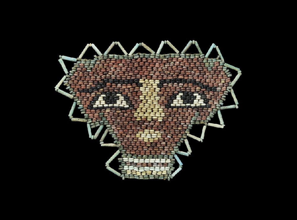 Egyptian Beaded Mummy Face MaskPtolemaic Period, 332-30 BC. A restrung panel of small glazed