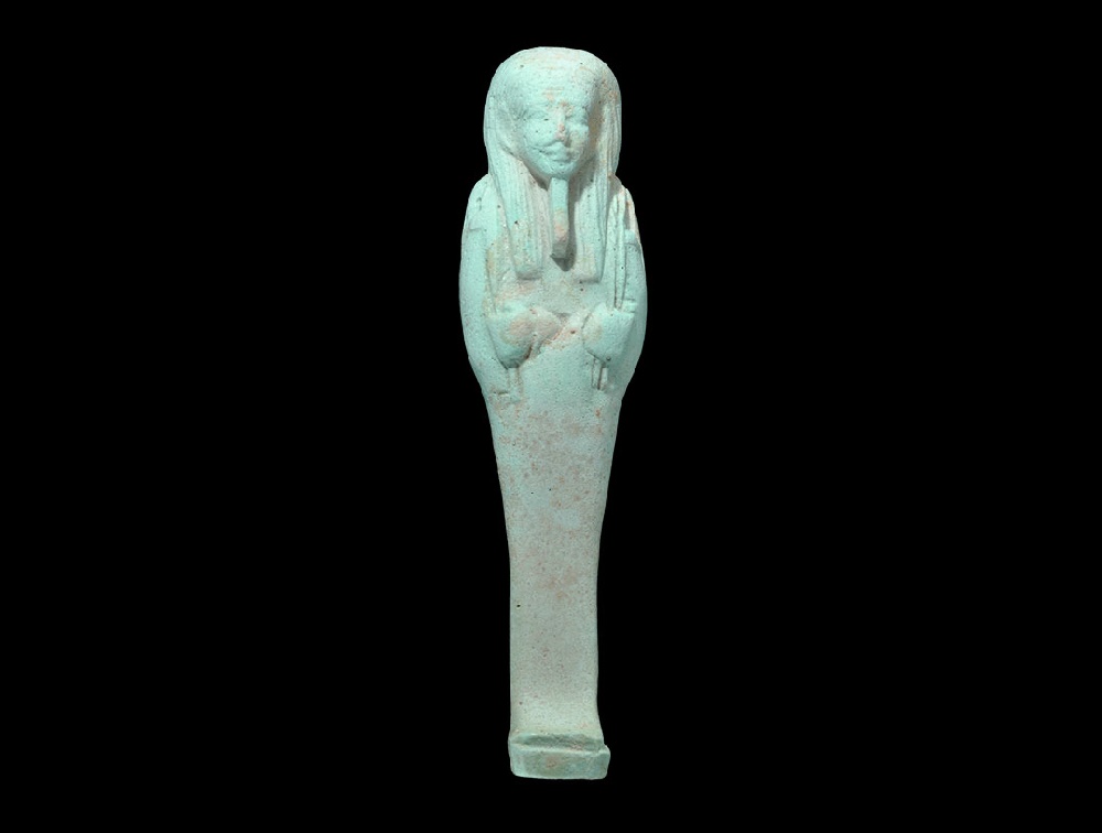 Egyptian Glazed Composition Hieroglyphic ShabtiPtolemaic Period, 332-30 BC. A pale blue shabti