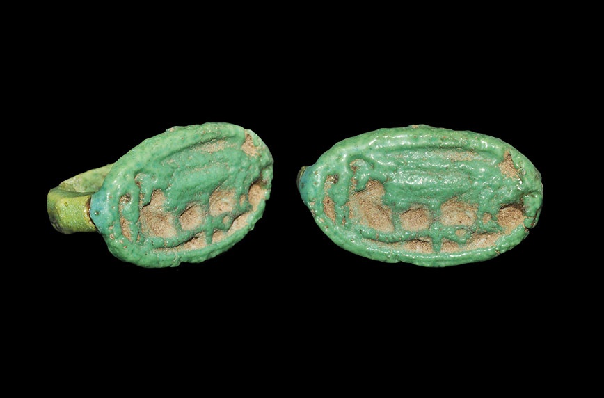 Egyptian Glazed Composition `Nut` Finger RingNew Kingdom, 1550-1070 BC. A green D-section hoop and