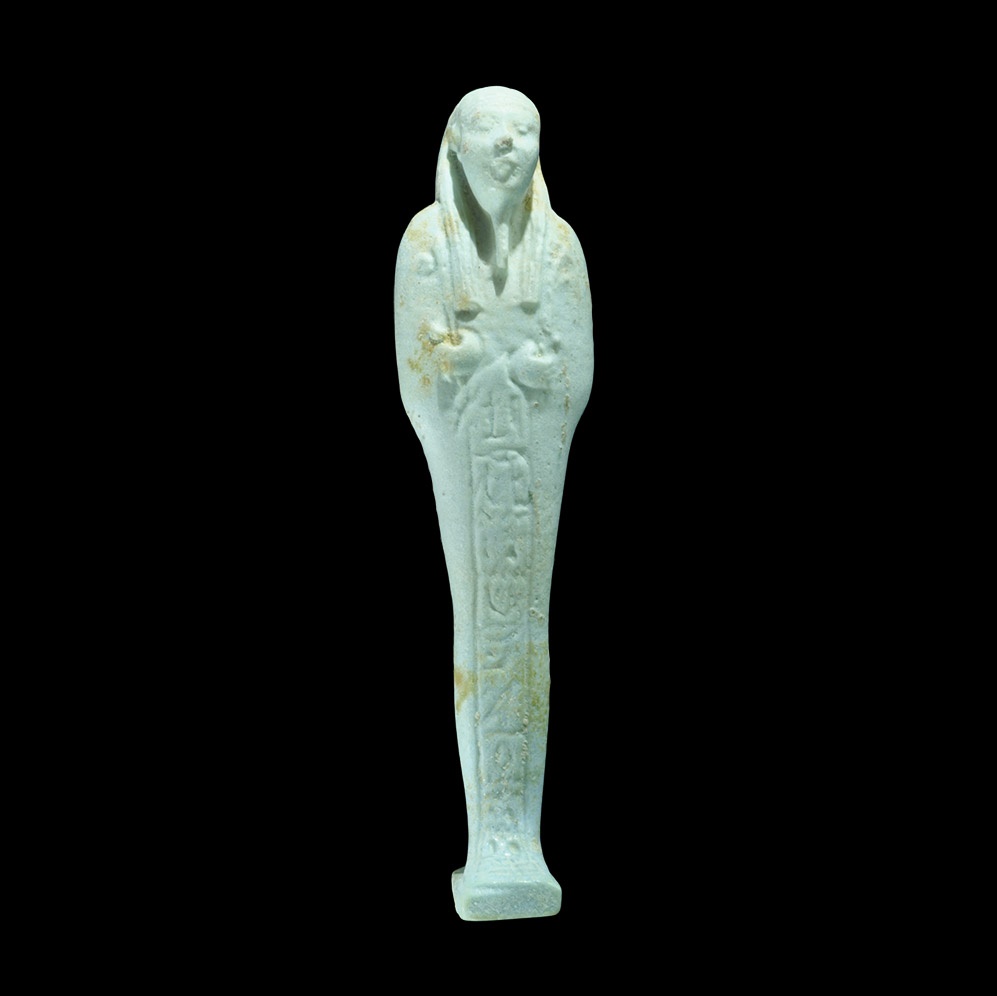 Egyptian Glazed Composition Hieroglyphic ShabtiLate Period, 664-332 BC. A finely made pale blue