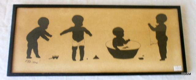 Framed silhouettes of babies signed CHB 1934