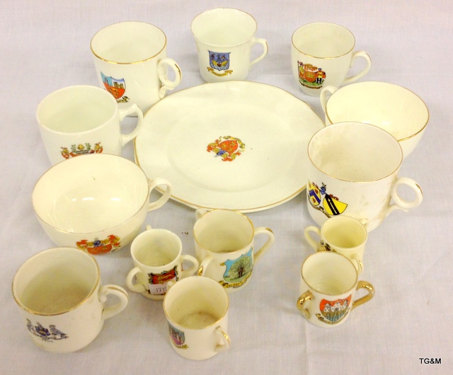 Twelve pieces of crested, cups and a plate