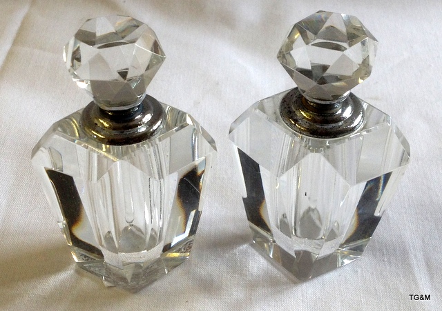 A pair of matching Art Deco style perfume bottles