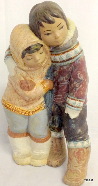 Large Lladro figurine of Eskimo Boy and Girl.  Matt finish, impressed no.2038.  38cm high