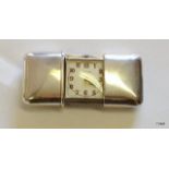 A Stirling silver Movado ladies purse watch in working order