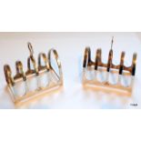 A pair of silver toast racks, hallmarked Sheffield 1938 maker EV, 107gms