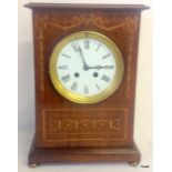 An Edwardian Mahogany inlaid 8 day striking mantle clock complete with key h  33 x w  23 x d  14cm