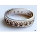 A 9ct white gold eternity ring size m