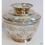 An embossed silver lidded urn 10cm tall, hallmarked London 1897 maker,330gms