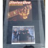 A Status Quo signed photo record montage